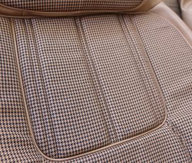New Seat Skins/Covers/Trims made with FORD XC Houndstooth Seat cloth fabric "ginger" Falcon 500 HARDTOP V8 Fairmont GS Rally Pack Coupe material, and Novatex Vinyl "Ocher". Also available in other cloth colours like "Dusk", "Doeskin" cloth and vinyl colours like black, cream, camel etc. Can also make Cobra style seats with blue and black cloth fabric as per factory original.