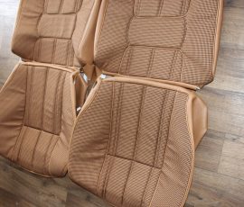 New Seat Skins/Covers/Trims made with FORD XC Houndstooth Seat cloth fabric "ginger" Falcon 500 HARDTOP V8 Fairmont GS Rally Pack Coupe material, and Novatex Vinyl "Ocher". Also available in other cloth colours like "Dusk", "Doeskin" cloth and vinyl colours like black, cream, camel etc. Can also make Cobra style seats with blue and black cloth fabric as per factory original.